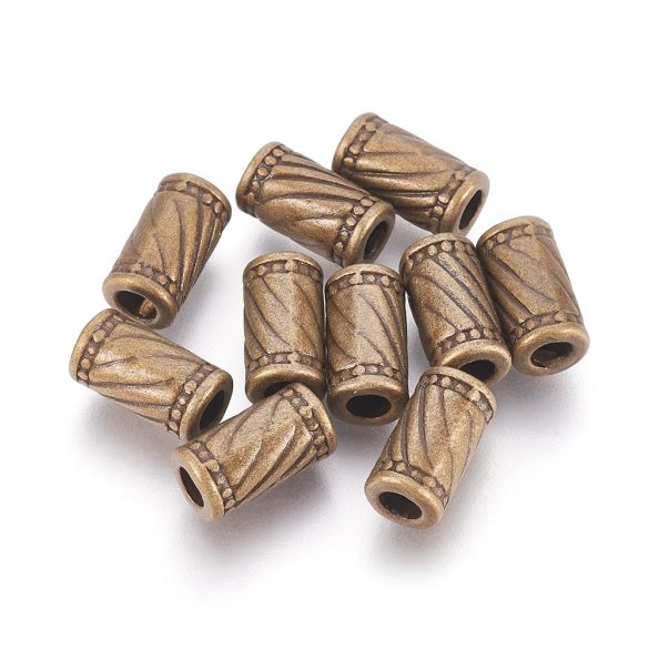 50db. Köztes fémgyöngy.. 11x6mm. Antik bronz szín.