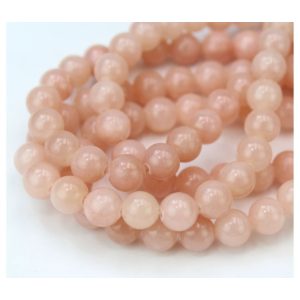 Jade ásványgyöngy. 6mm. Világos őszibarack. 1 szál.