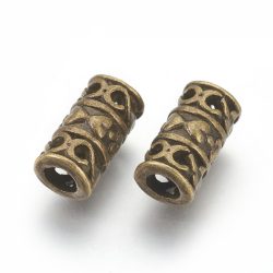 50db. Köztes fémgyöngy. Antik bronz szín. 12x6mm.