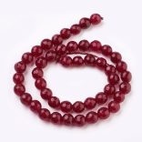  1 szál.Csiszolt jade ásványgyöngy. 8mm. Rubin szín.