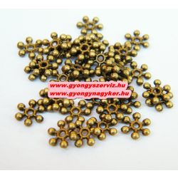   Hópehely. 8x2.5mm. Antik bronz színű. Fémgyöngy, köztes gyöngy. 100db.