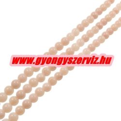   Ásványgyöngy, féldrágakő gyöngy. 8mm. Világos őszibarack jade. 1 szál, kb. 40cm.