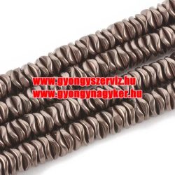  1 szál. Hematit hullámos tallér. Csokoládé szín. 6x1.5mm.