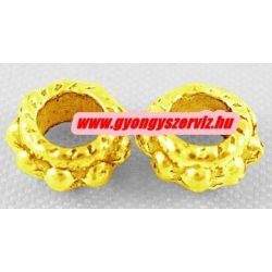 Fém köztes gyöngy. 6x3mm. Arany szín. 100db.