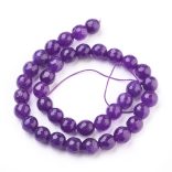 1 szál. Csiszolt jade ásványgyöngy. 8mm. Ametiszt szín.
