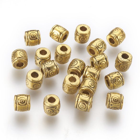 50db. Fém köztes gyöngy.6x6.5mm. Antik arany szín.