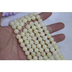Jade ásványgyöngy. 6mm. Világos krém. 1 szál.