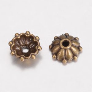 100db. Gyöngykupak. 8x3mm. Antik bronz szín.