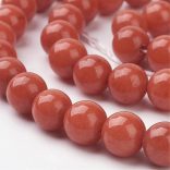 Jade ásványgyöngy. 8mm. Sötét narancs. 1 szál. (kb. 40cm)