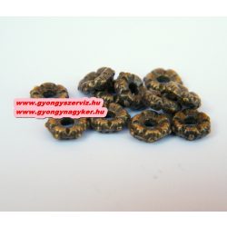   Korong. 5x1.7mm. Antik bronz szín. Fémgyöngy, köztes gyöngy. 100db.