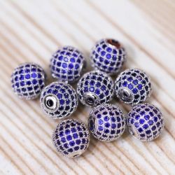 Cirkon köztes gyöngy. 10mm. Platina szín, kék kristály.