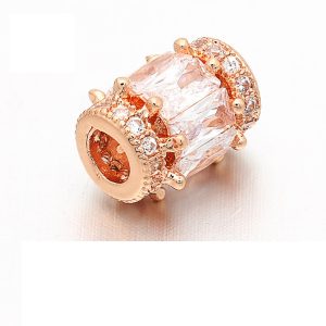 Cirkon kristályos köztes gyöngy. 11.5x9.8mm. Rózsaarany szín.