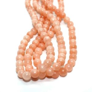 Jade ásványgyöngy. 6mm. Hús szín. 1 szál.