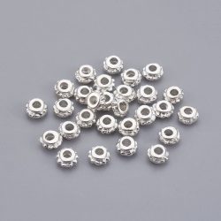 Fém köztes gyöngy. 5x3.5mm. Ezüst szín. 100db/csomag.