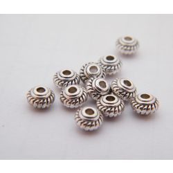 Fém köztes gyöngy. 5x3mm. Antik ezüst szín. 100db.