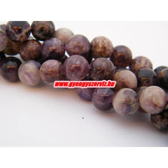 1 szál. Csaroit ásványgyöngy. 8mm.