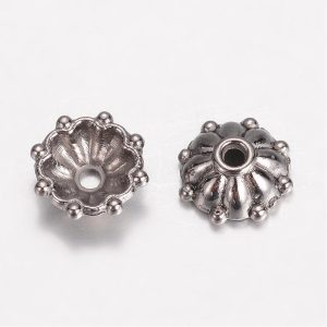 100db. Gyöngykupak. 8x3mm. Fekete szín.