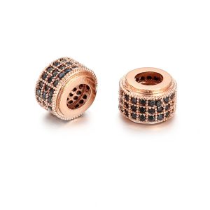 Kiárusítás! Cirkon köztes gyöngy. 9x6mm. Rózsaarany szín, fekete kristály.